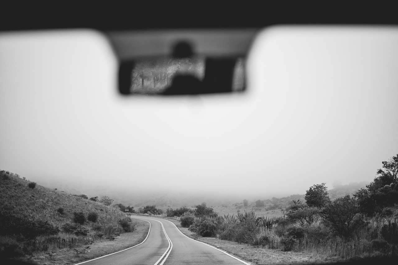 Rear view mirror above road