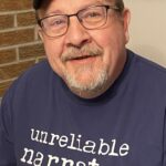 Headshot of author Ed McManis