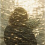 woman and sunlight on water