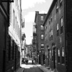 Black and white urban alleyway